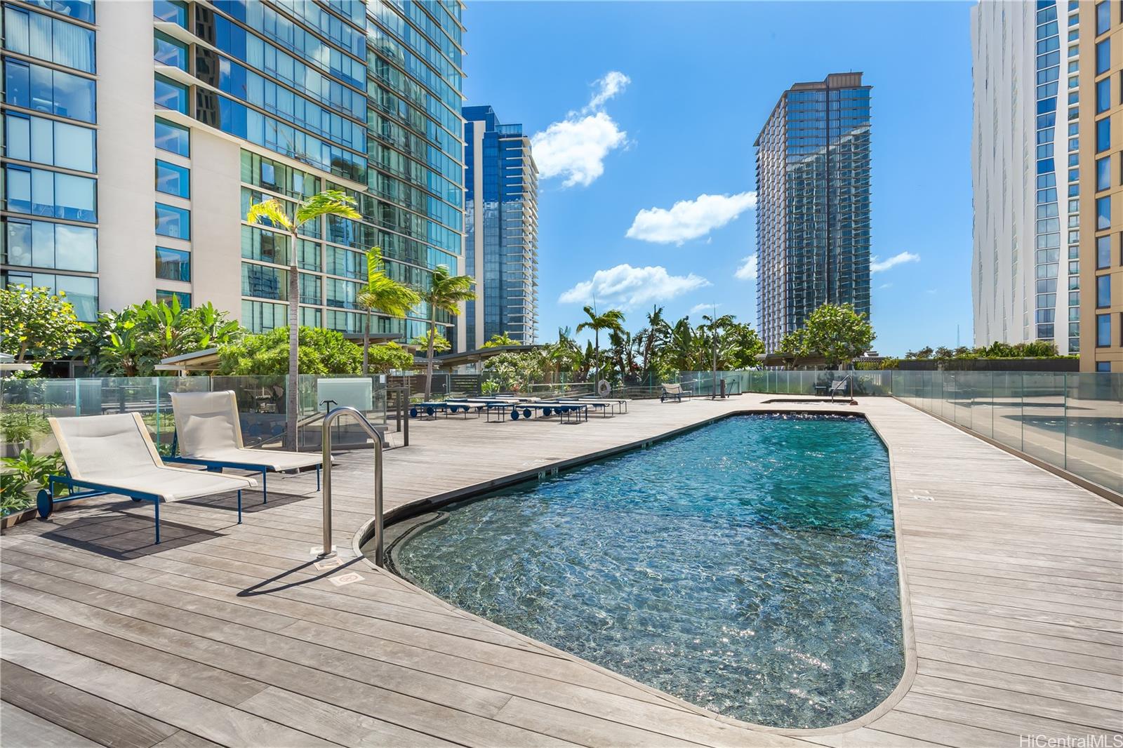 1001 Queen Street, Unit 3907 Honolulu, HI 96814 - Photo 20 of 25 a view of swimming pool with outdoor seating