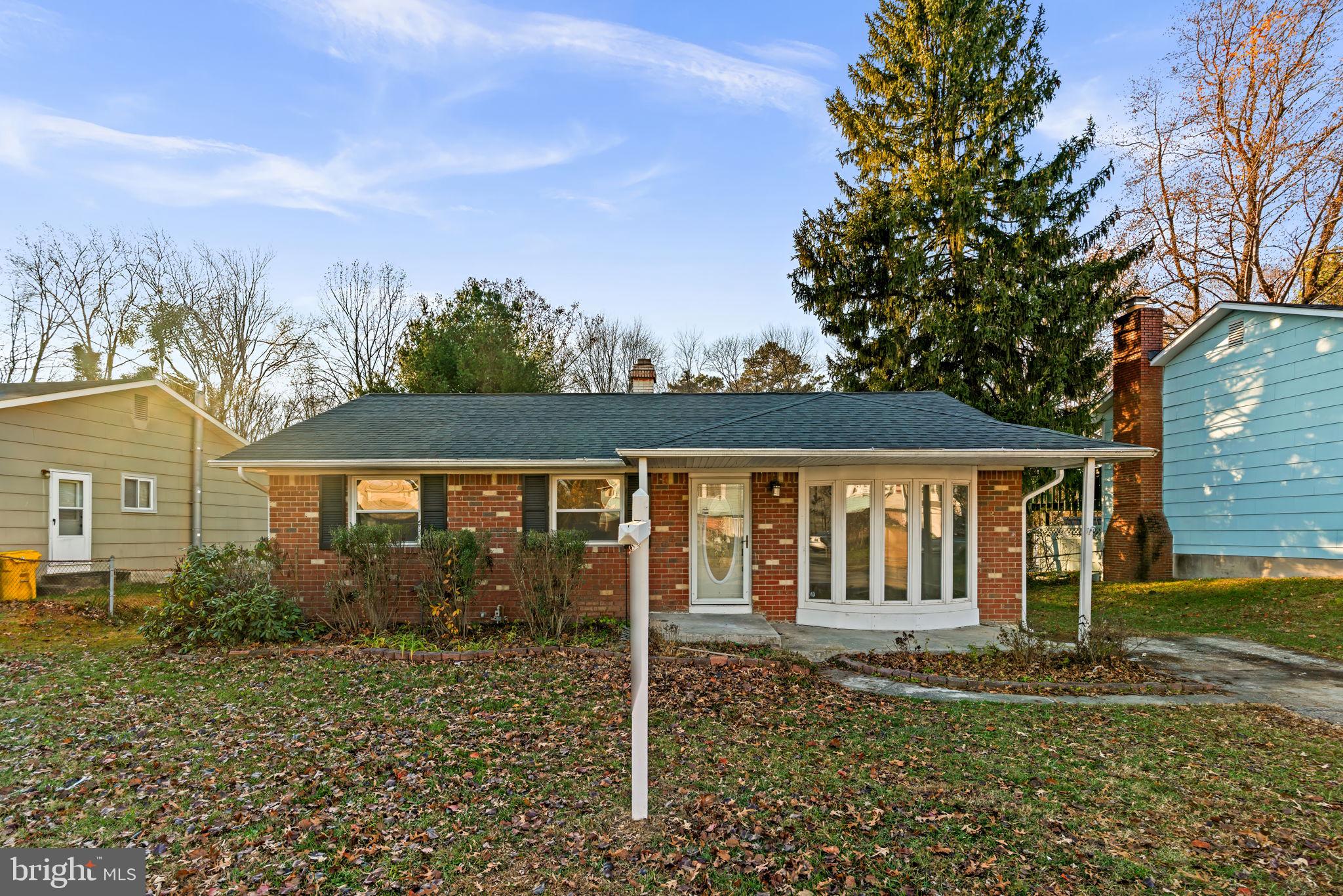 front view of house with a yard