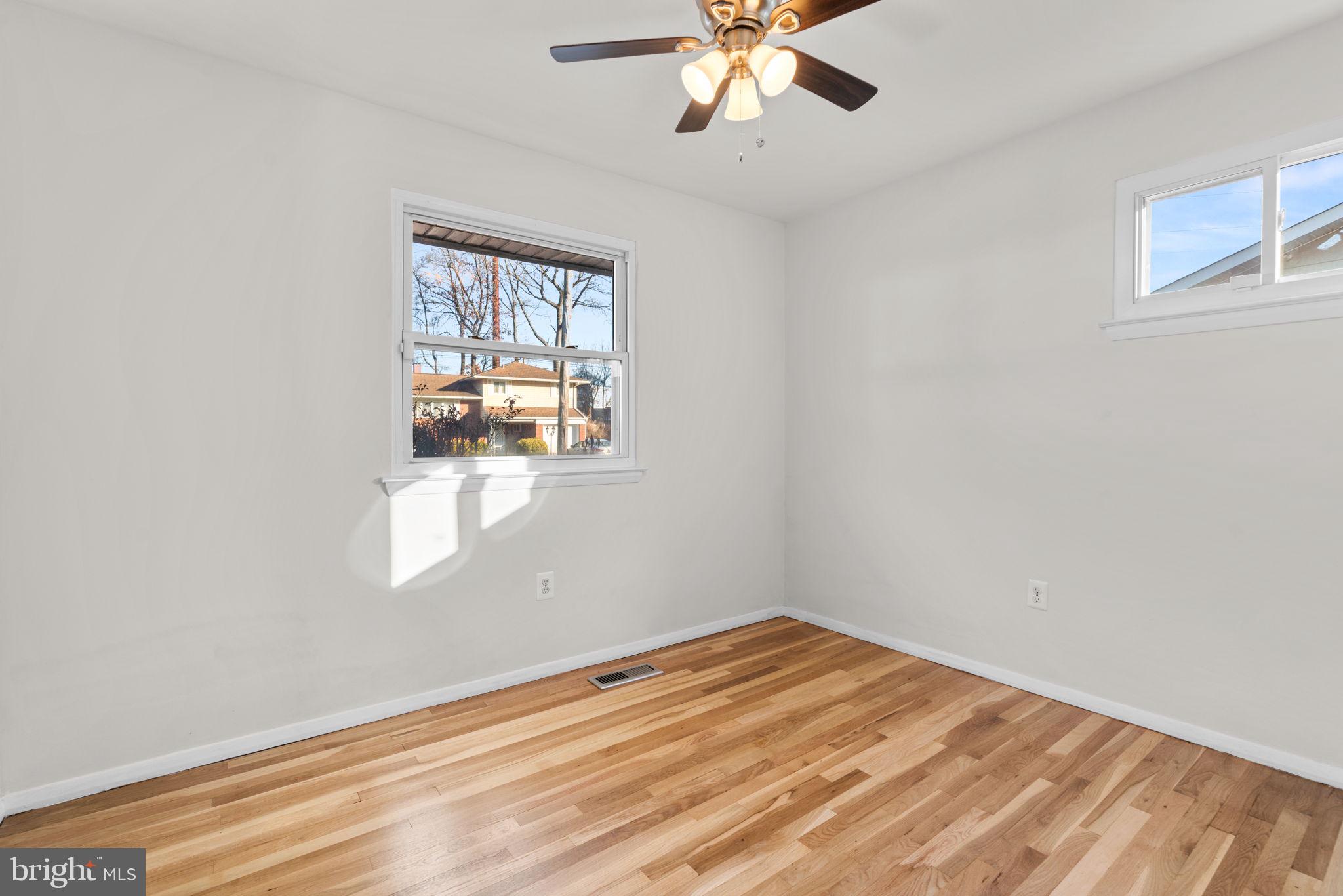 8111 Phirne Road East Glen Burnie, MD 21061 - Photo 12 of 30 a view of empty room with window