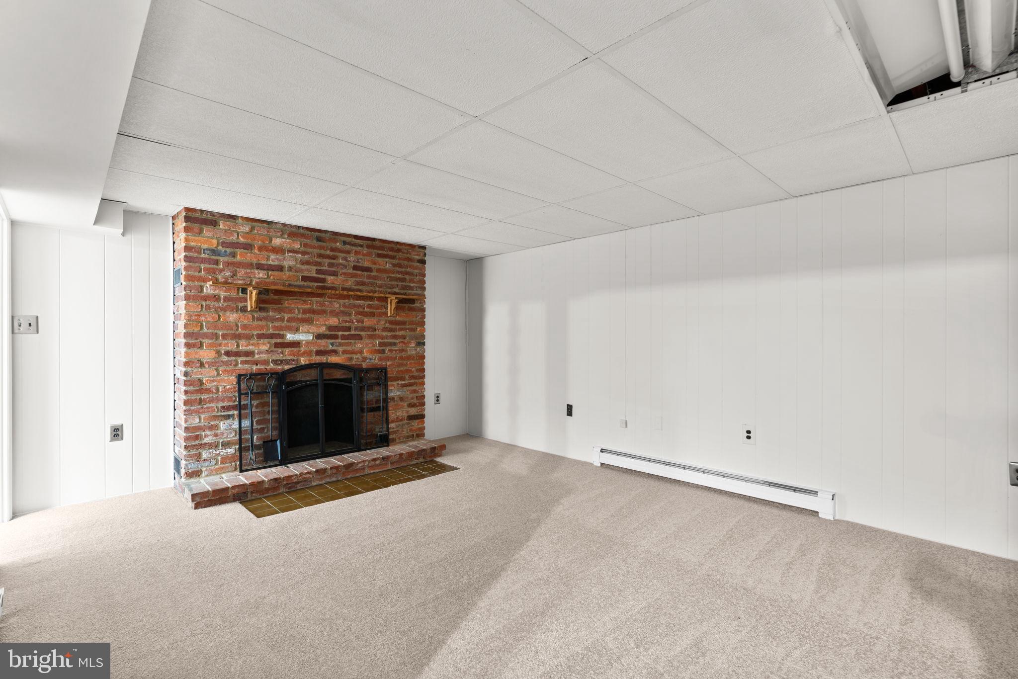 8111 Phirne Road East Glen Burnie, MD 21061 - Photo 19 of 30 a view of empty room with a fireplace