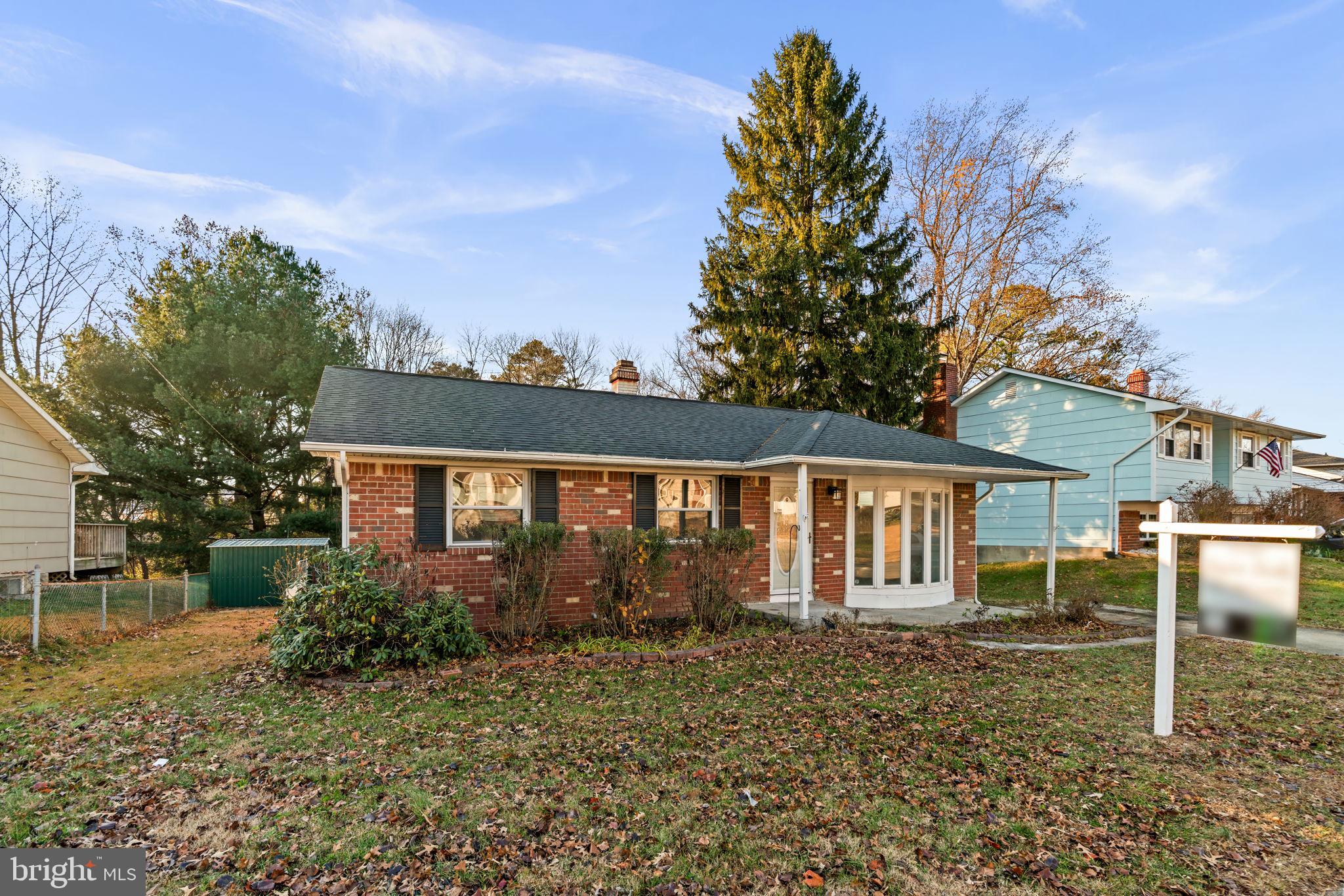 8111 Phirne Road East Glen Burnie, MD 21061 - Photo 2 of 30 front view of a house with a yard