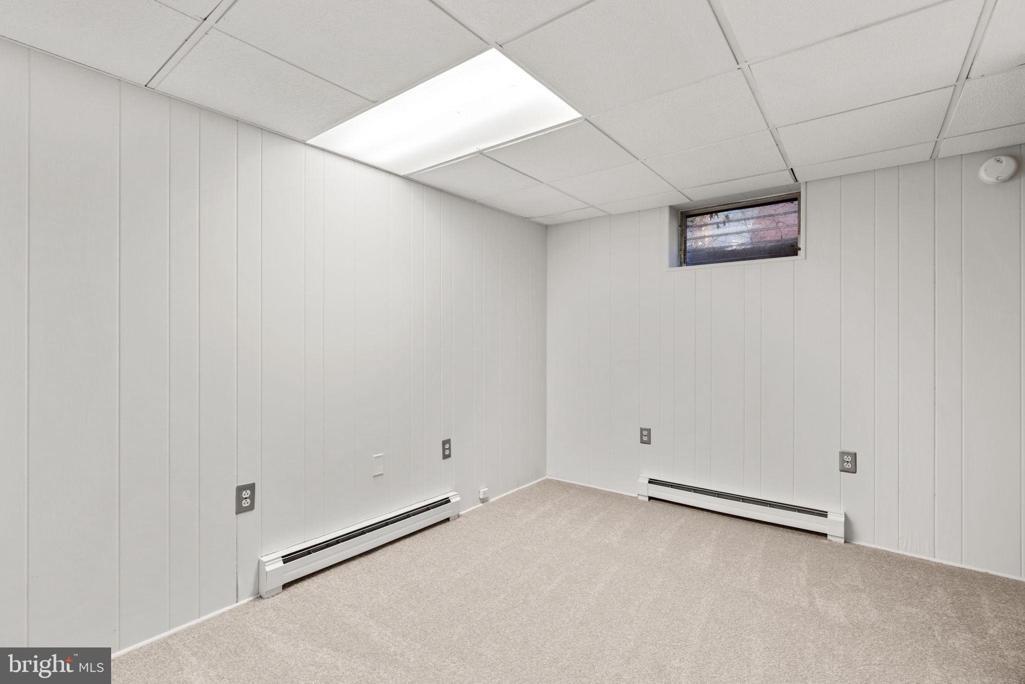 8111 Phirne Road East Glen Burnie, MD 21061 - Photo 25 of 30 wooden floor in an empty room