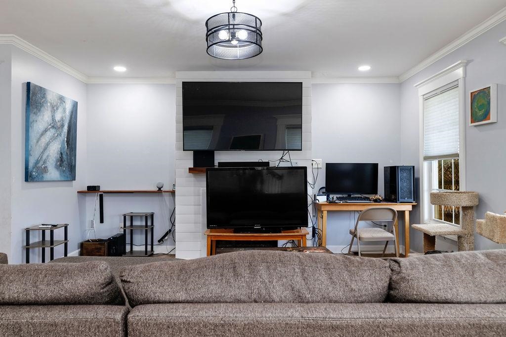 124 Wexford Street Staunton, VA 24401 - Photo 13 of 31 a living room with furniture and a flat screen tv
