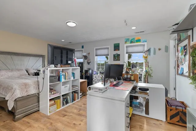 a room with furniture and a flat screen tv