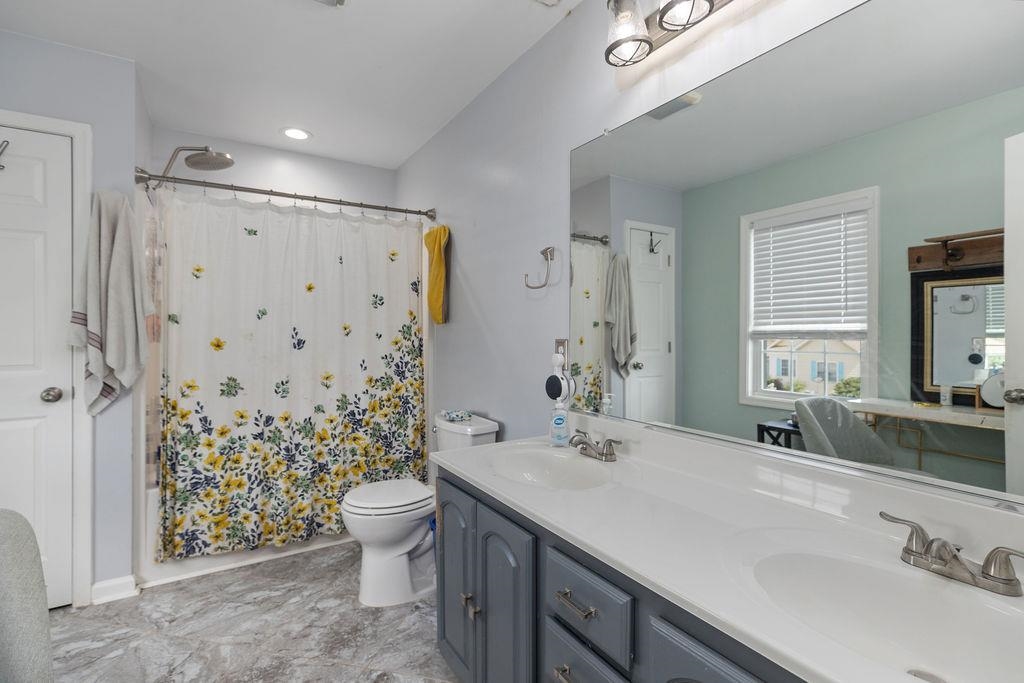 124 Wexford Street Staunton, VA 24401 - Photo 28 of 31 a bathroom with a double vanity sink toilet and shower
