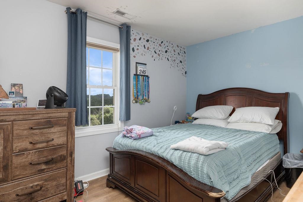 124 Wexford Street Staunton, VA 24401 - Photo 30 of 31 a bedroom with a bed and a window