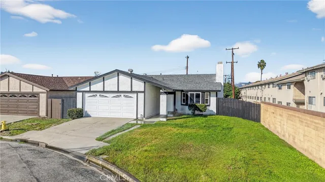a house view with a garden space
