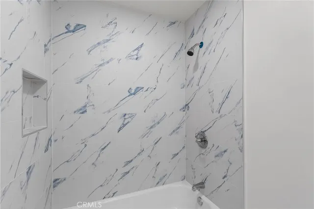 a bathroom with a shower curtain