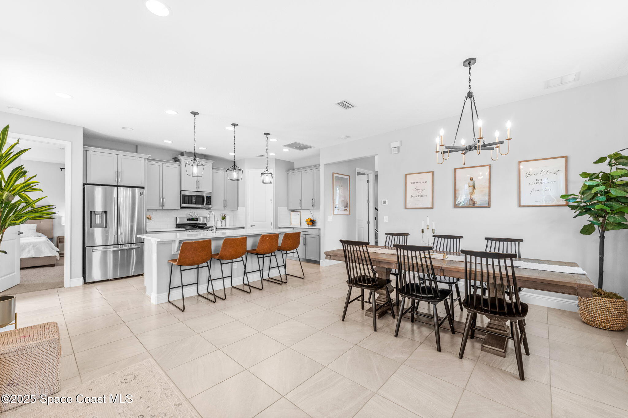 3089 Ribbon Grass Drive Melbourne, FL 32940 - Photo 13 of 57 a view of a dining room with furniture
