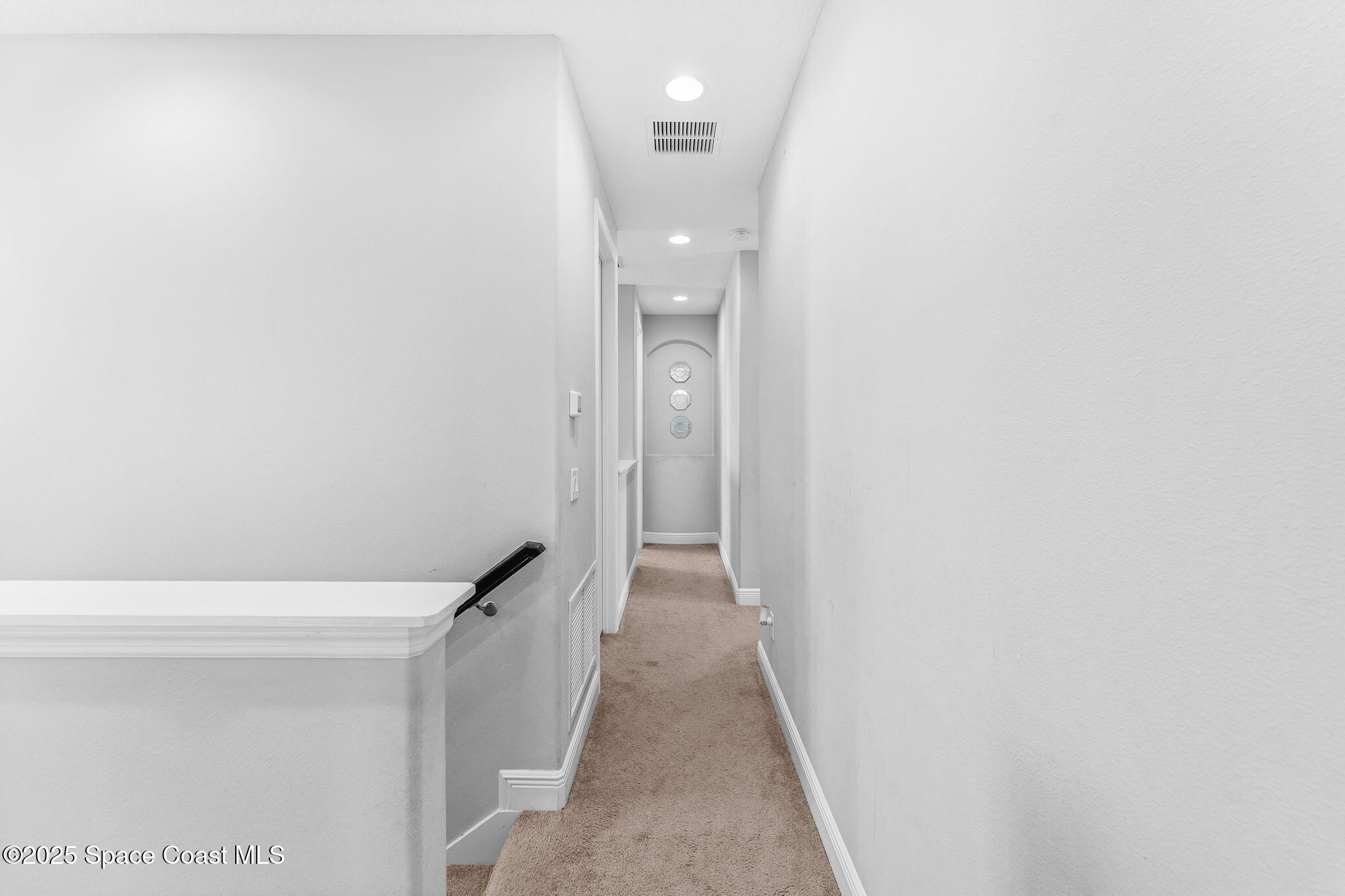 3089 Ribbon Grass Drive Melbourne, FL 32940 - Photo 31 of 57 a view of a hallway with closet