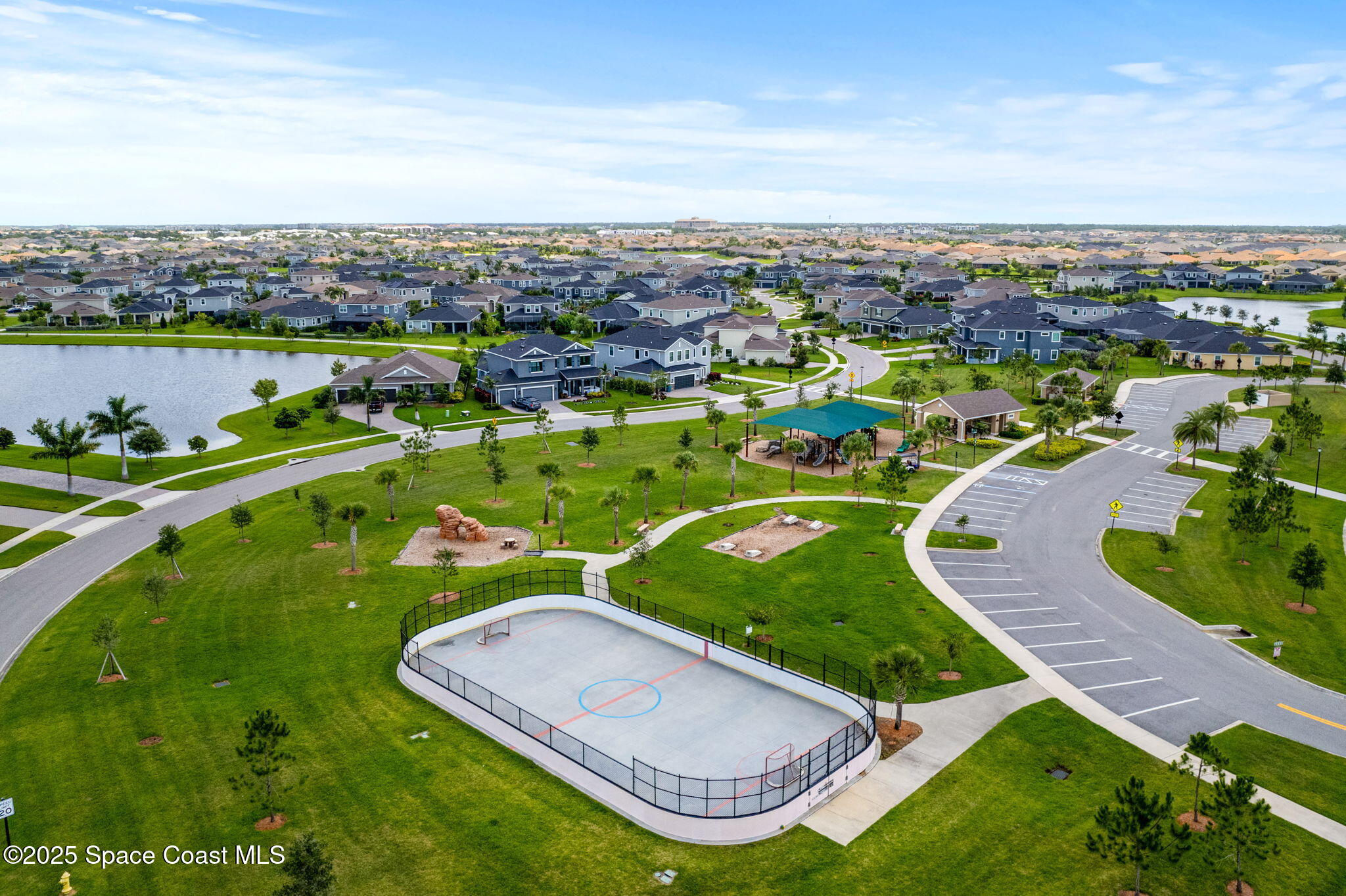 3089 Ribbon Grass Drive Melbourne, FL 32940 - Photo 46 of 57 an aerial view of a residential houses with outdoor space and street view