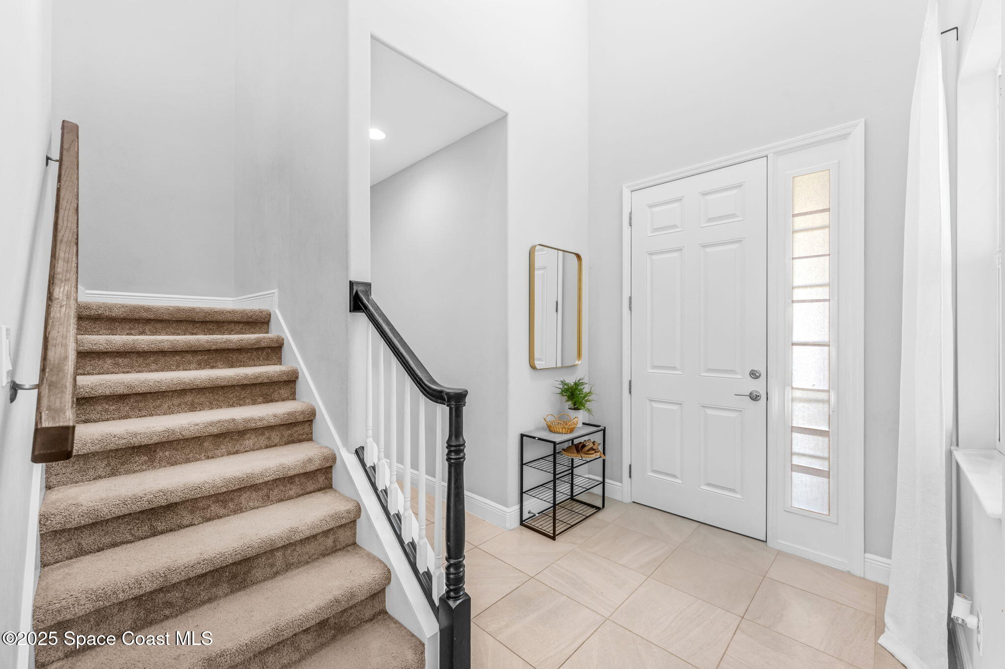 3089 Ribbon Grass Drive Melbourne, FL 32940 - Photo 4 of 57 a view of an entryway with stairs