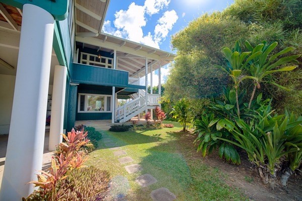 4451 Mahimahi Road Hanalei, HI 96714 - Photo 18 of 25 a front view of a house with a yard