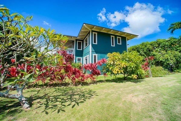 4451 Mahimahi Road Hanalei, HI 96714 - Photo 19 of 25 a front view of a house with a yard