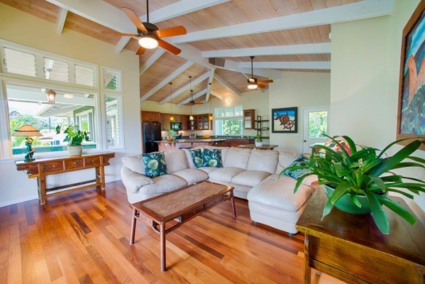 4451 Mahimahi Road Hanalei, HI 96714 - Photo 3 of 25 a living room with furniture a potted plant and a large window