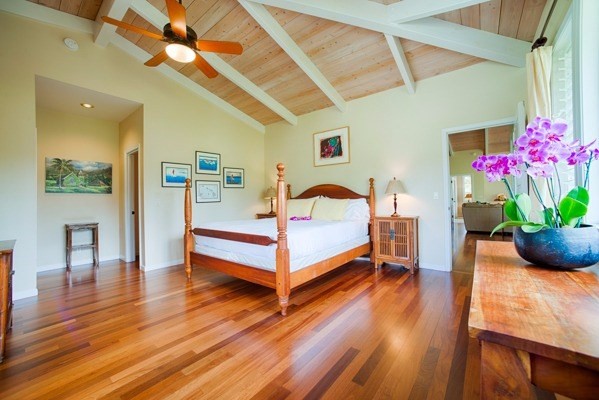 4451 Mahimahi Road Hanalei, HI 96714 - Photo 5 of 25 a bedroom with furniture and a wooden floor