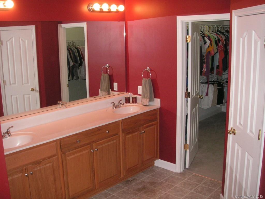 312 Altovista Court Fort Mill, SC 29708 - Photo 11 of 24 a bathroom with a sink and a mirror