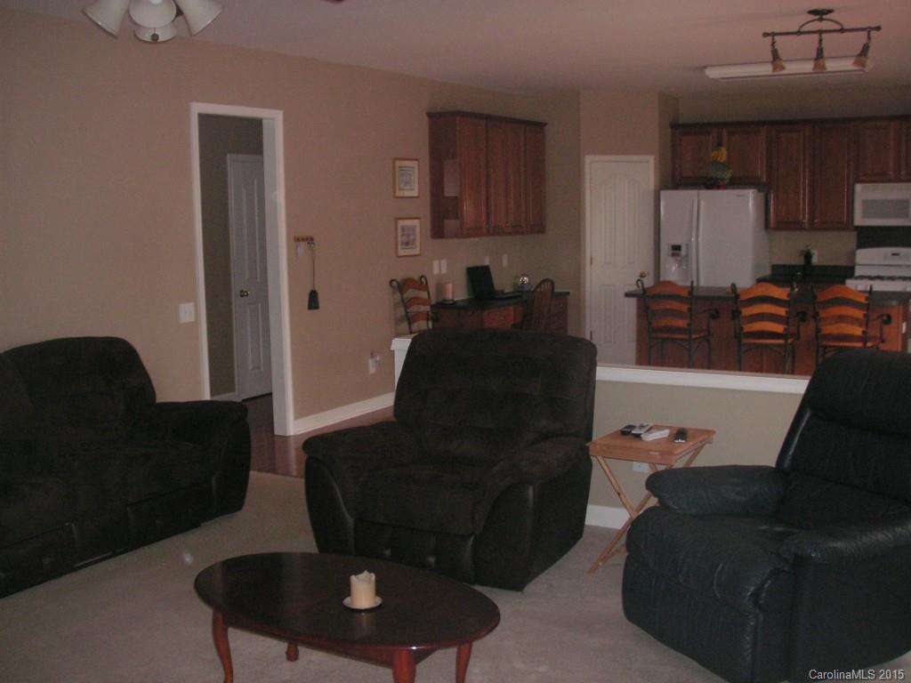 312 Altovista Court Fort Mill, SC 29708 - Photo 12 of 24 a living room with furniture rug and a lamp