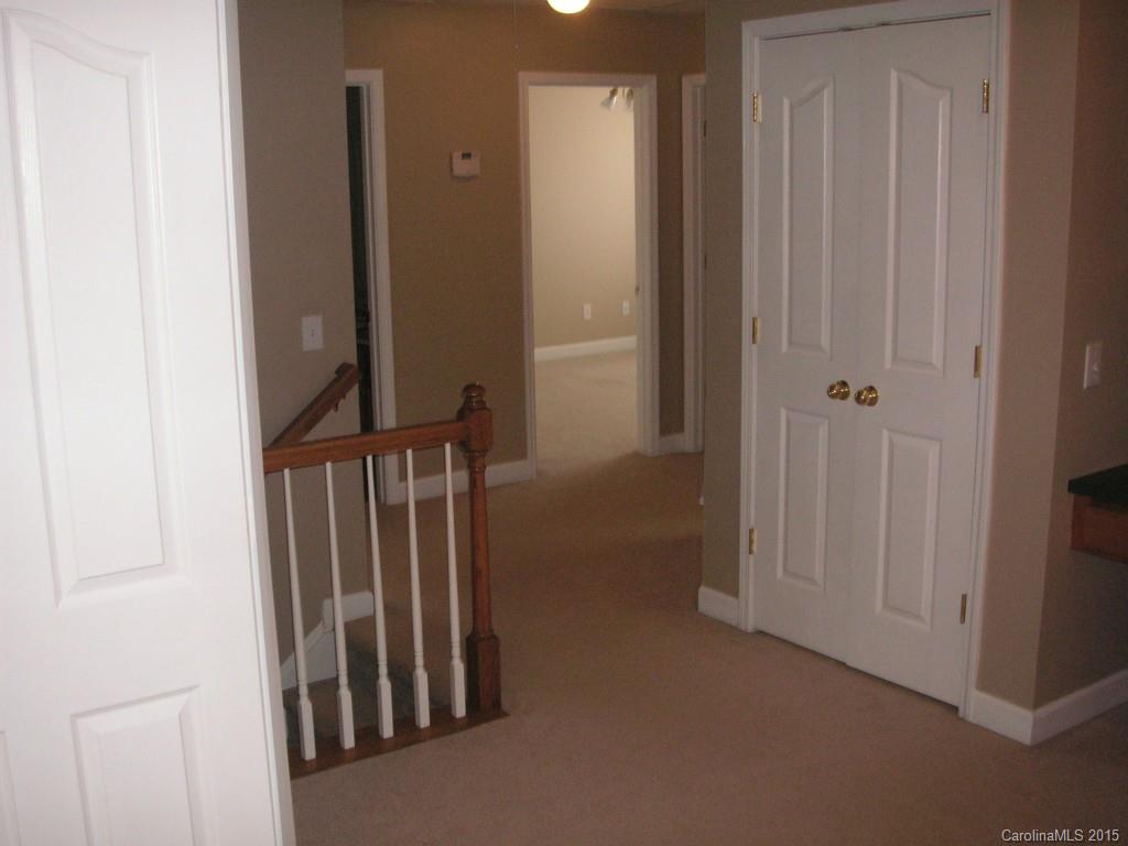 312 Altovista Court Fort Mill, SC 29708 - Photo 17 of 24 a view of a hallway with wooden floor