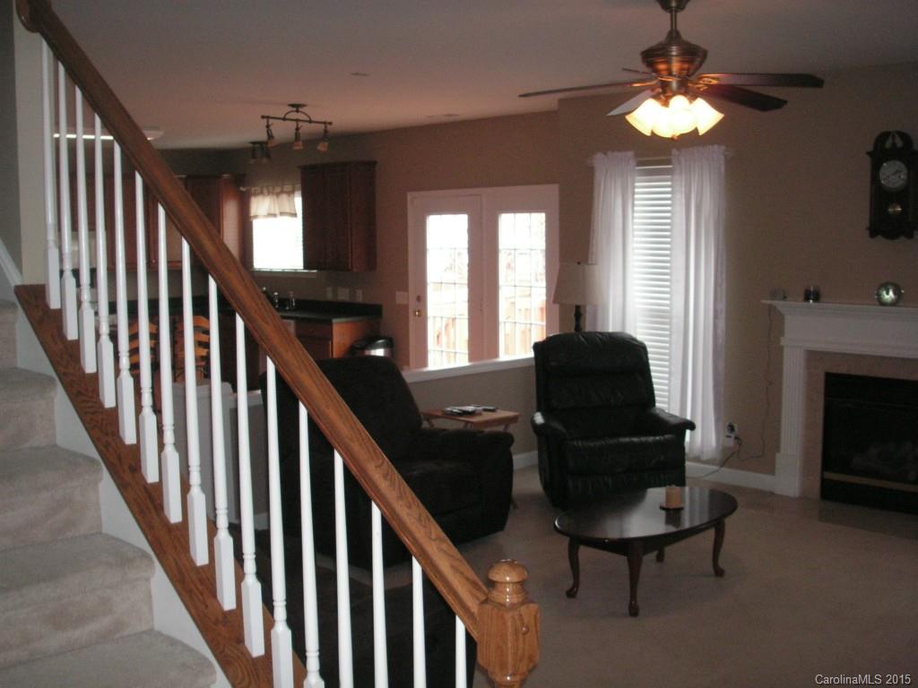 312 Altovista Court Fort Mill, SC 29708 - Photo 3 of 24 a living room with furniture and a fireplace