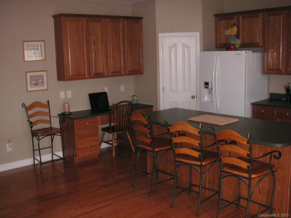 312 Altovista Court Fort Mill, SC 29708 - Photo 6 of 24 a view of a dining room with furniture and wooden floor