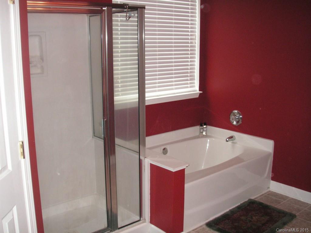 312 Altovista Court Fort Mill, SC 29708 - Photo 10 of 24 a bathroom with a tub and a window