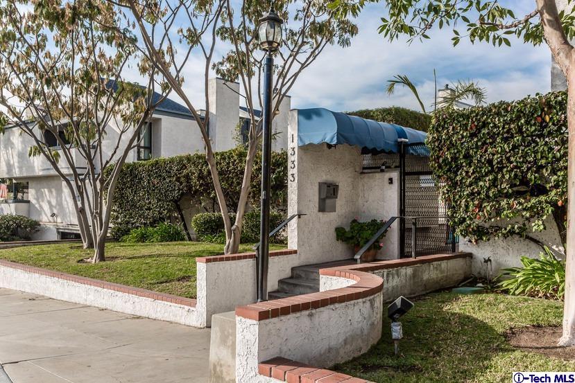 1333 Valley View Road, Unit 8 Glendale, CA 91202 - Photo 1 of 6 front view of a house with a yard and potted plants