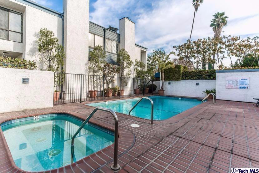 1333 Valley View Road, Unit 8 Glendale, CA 91202 - Photo 6 of 6 a swimming pool with outdoor seating and yard