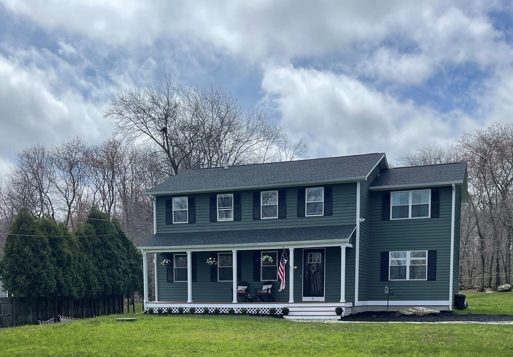 71 Narrows Road Freetown, MA 02702 - Photo 1 of 24 front view of a brick house with a yard
