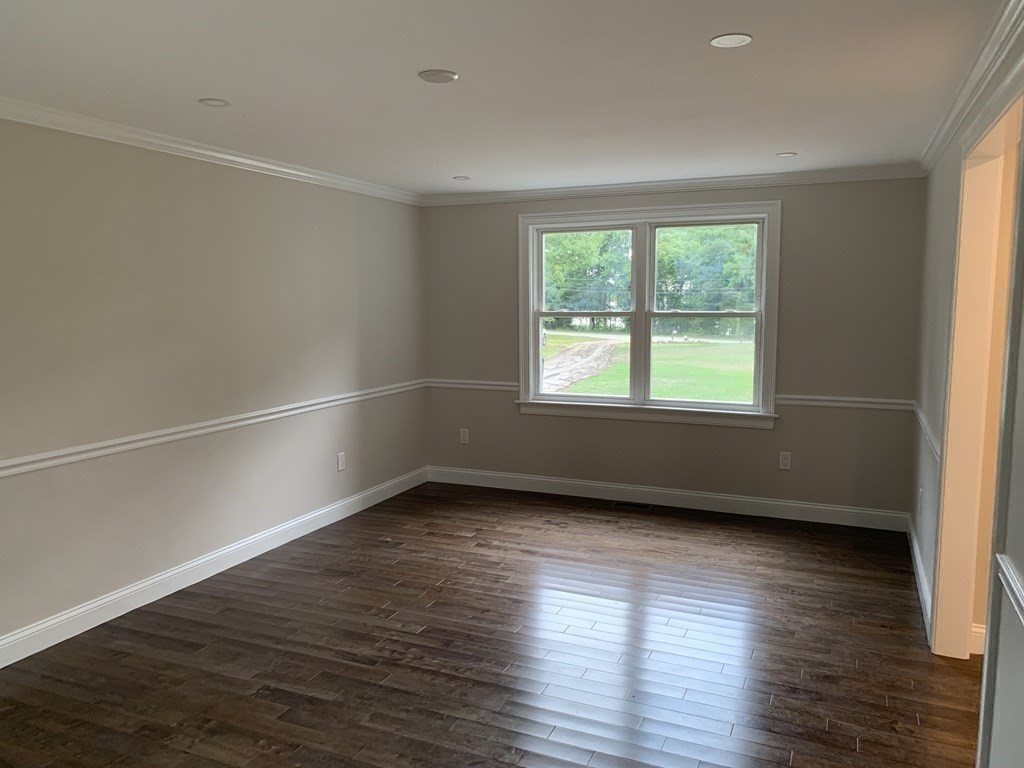 71 Narrows Road Freetown, MA 02702 - Photo 12 of 24 an empty room with wooden floor and windows