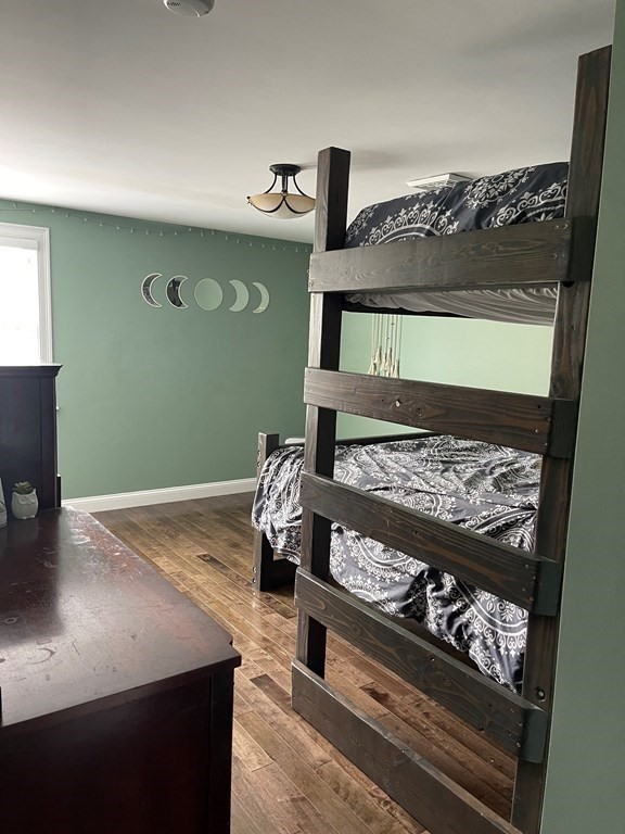 71 Narrows Road Freetown, MA 02702 - Photo 16 of 24 a bed sitting in a room next to a window