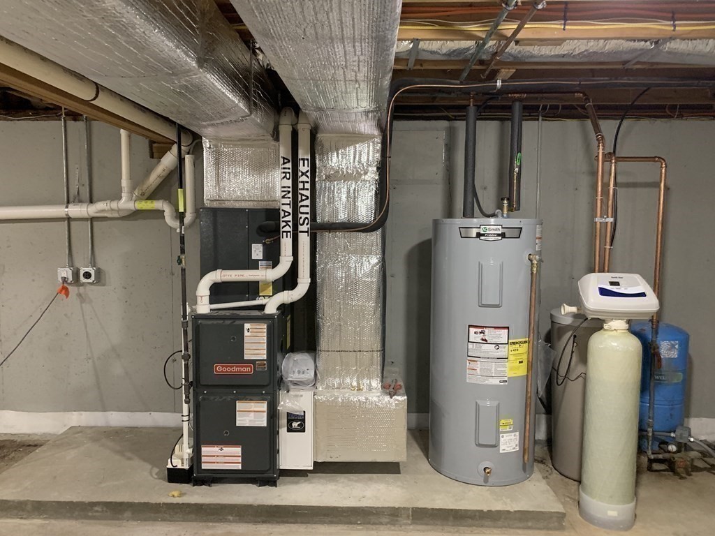 71 Narrows Road Freetown, MA 02702 - Photo 19 of 24 a room with water heater and storage