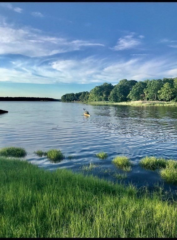 71 Narrows Road Freetown, MA 02702 - Photo 5 of 24 a view of a lake from a yard