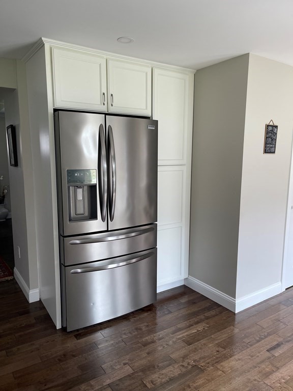 71 Narrows Road Freetown, MA 02702 - Photo 7 of 24 a metallic refrigerator freezer sitting in a kitchen