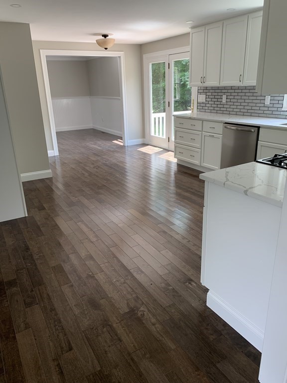 71 Narrows Road Freetown, MA 02702 - Photo 8 of 24 a kitchen with wooden floors and wide window