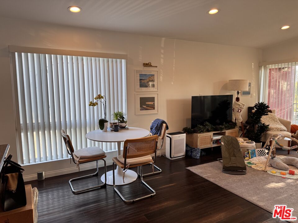 2639 6th Street Santa Monica, CA 90405 - Photo 3 of 22 a view of a livingroom with furniture and a flat screen tv