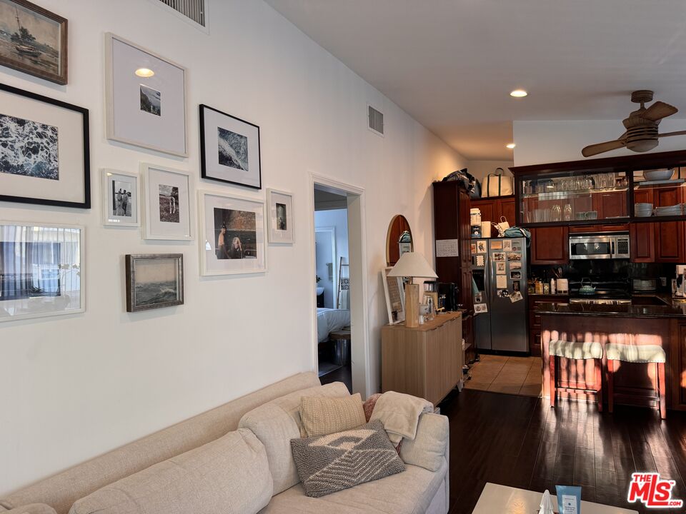 2639 6th Street Santa Monica, CA 90405 - Photo 4 of 22 a living room with furniture and a flat screen tv