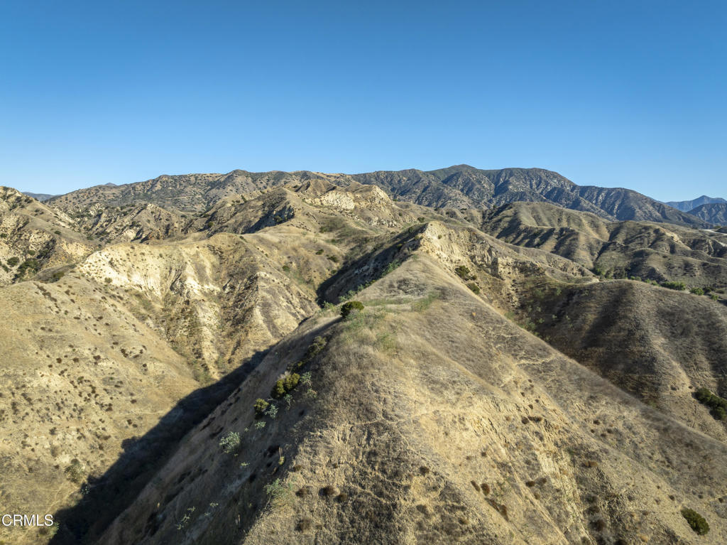 9701 Foothill Boulevard Lakeview Terrace, CA 91342 - Photo 11 of 51 a view of a large mountain with mountains in the background