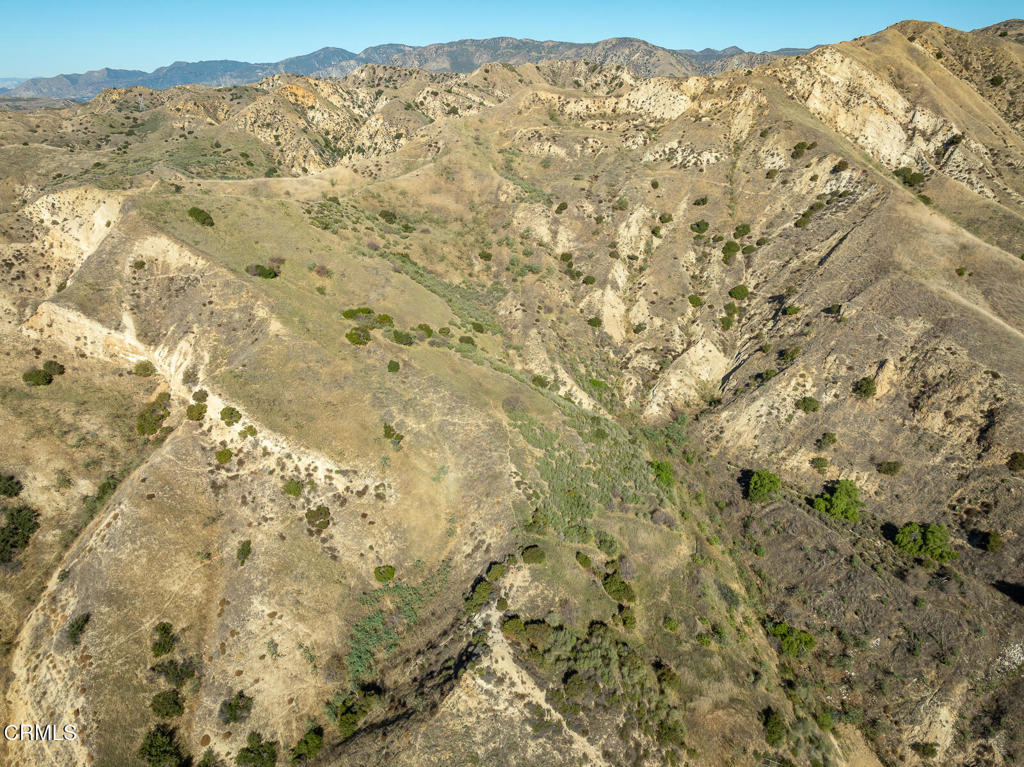 9701 Foothill Boulevard Lakeview Terrace, CA 91342 - Photo 29 of 51 a view of a field with mountains in the background