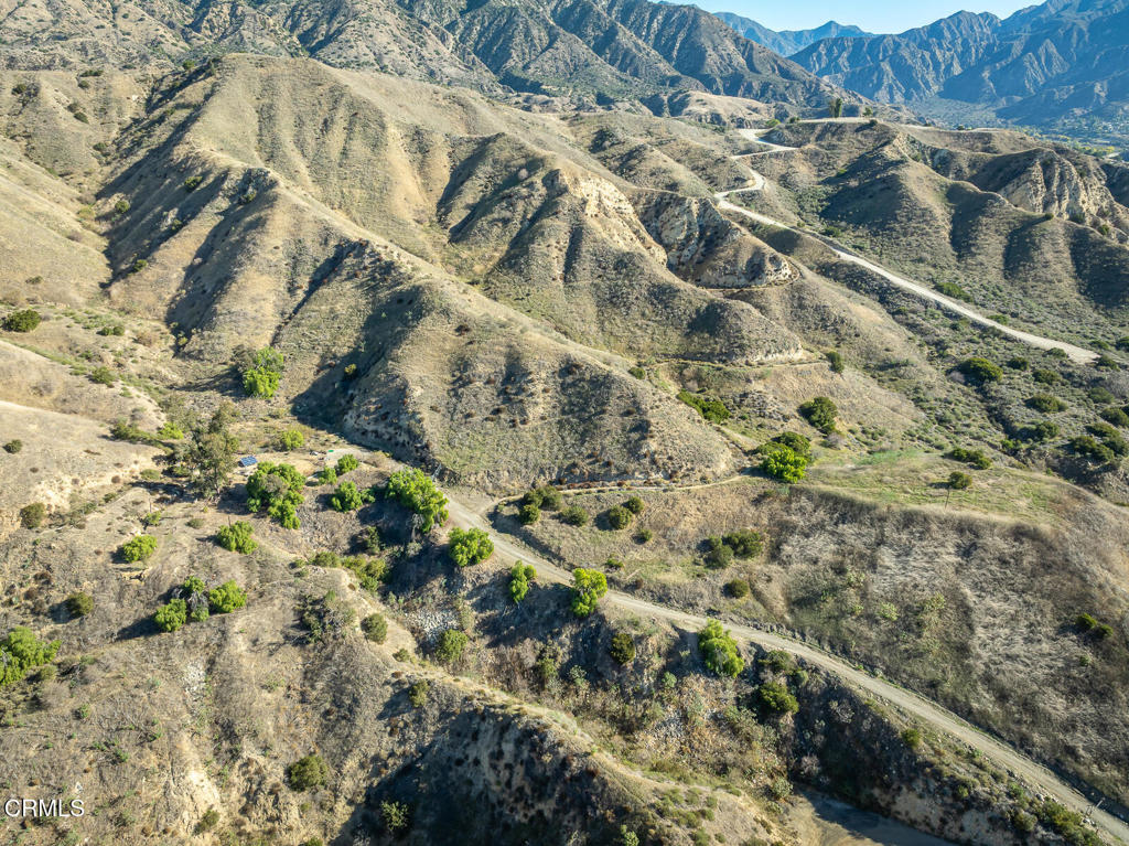 9701 Foothill Boulevard Lakeview Terrace, CA 91342 - Photo 3 of 51 a view of a yard with a house