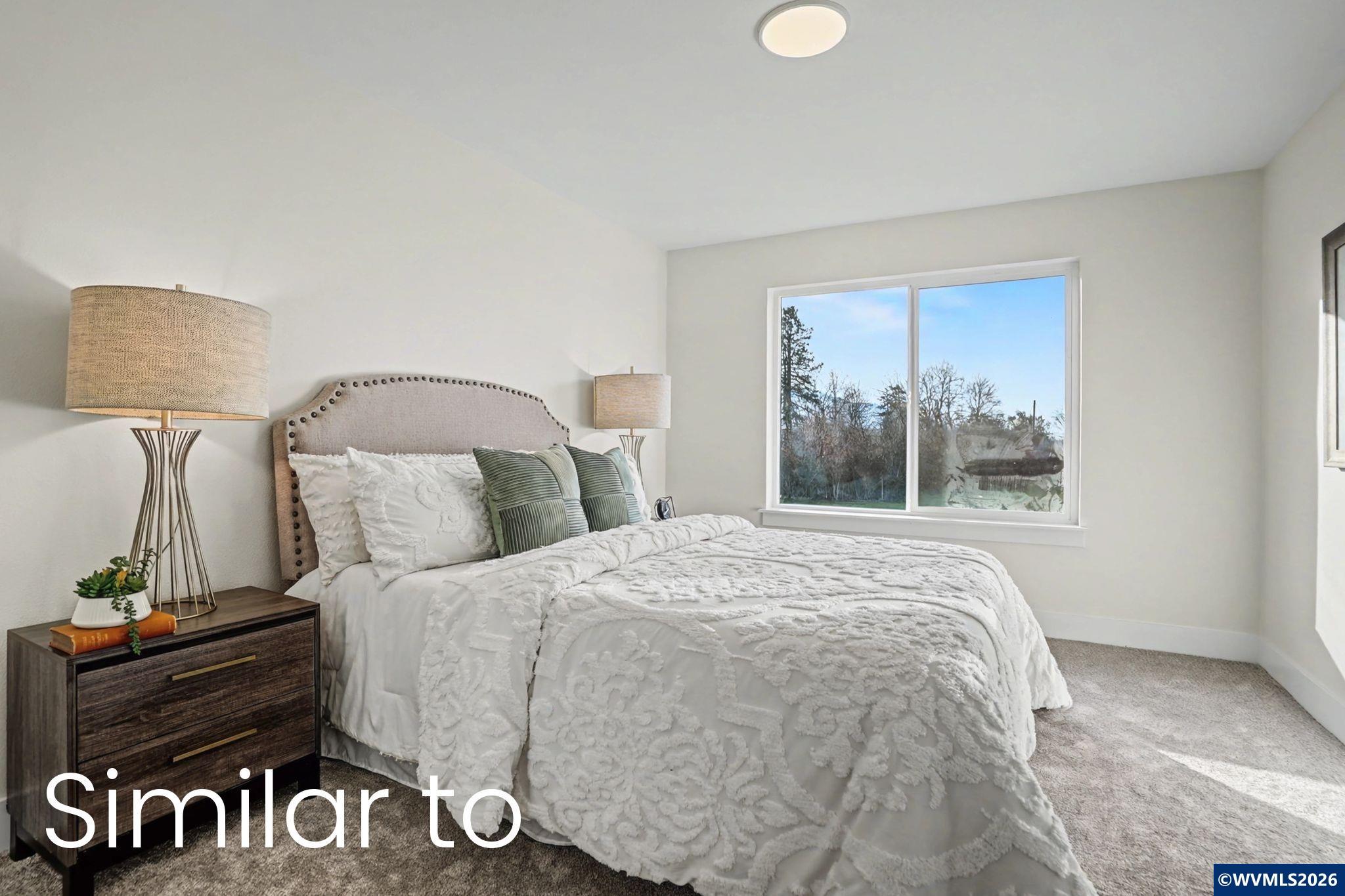 2550 Promise Way Lebanon, OR 97355 - Photo 21 of 35 a bedroom with a bed and window