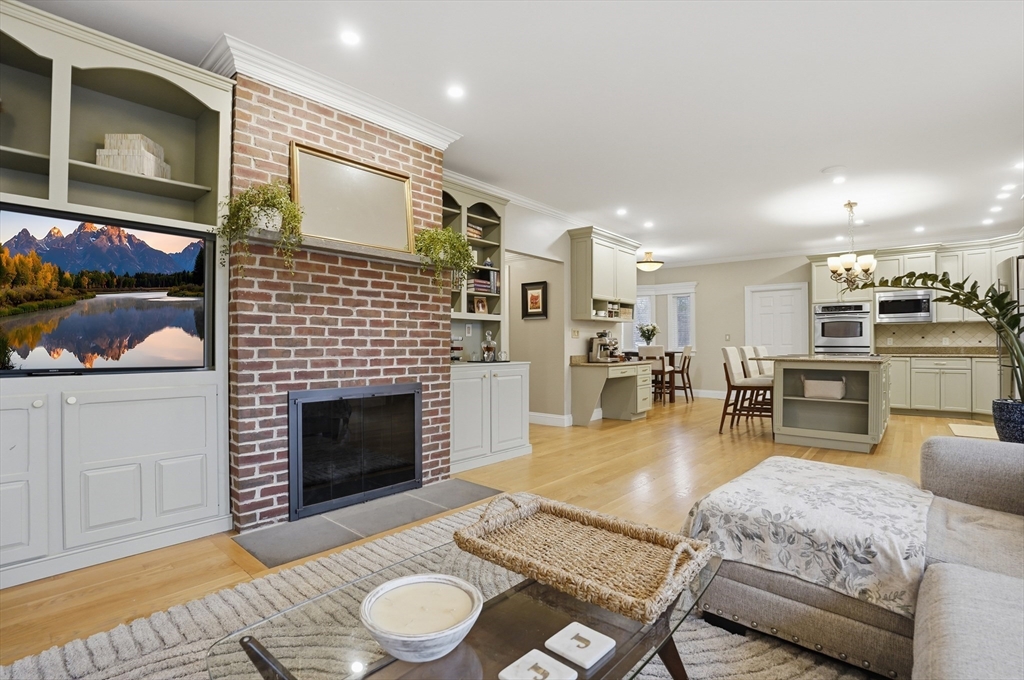 531 Salisbury Street Worcester, MA 01609 - Photo 12 of 42 a living room with furniture and a fireplace