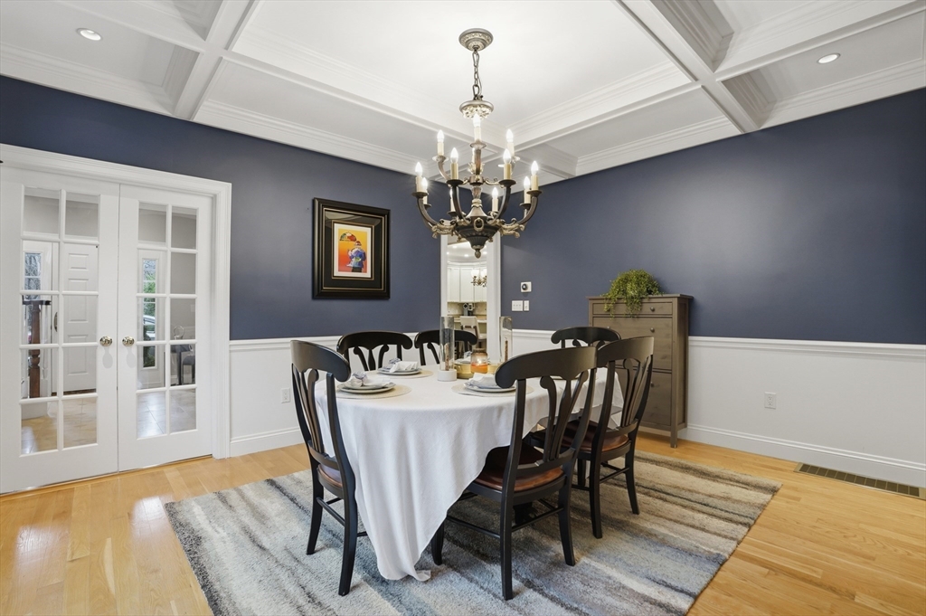 531 Salisbury Street Worcester, MA 01609 - Photo 14 of 42 a view of a dining room with furniture wooden floor and chandelier