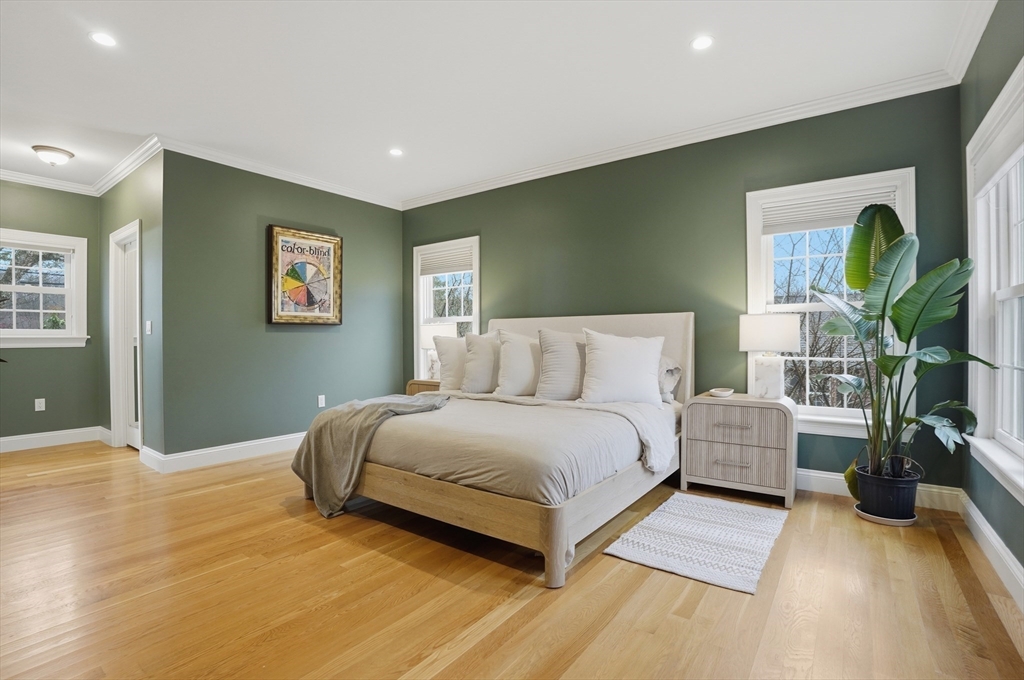 531 Salisbury Street Worcester, MA 01609 - Photo 17 of 42 a spacious bedroom with a bed and a couch