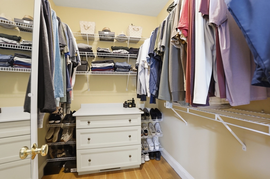 531 Salisbury Street Worcester, MA 01609 - Photo 20 of 42 a view of walk in closet with clothes and shoes