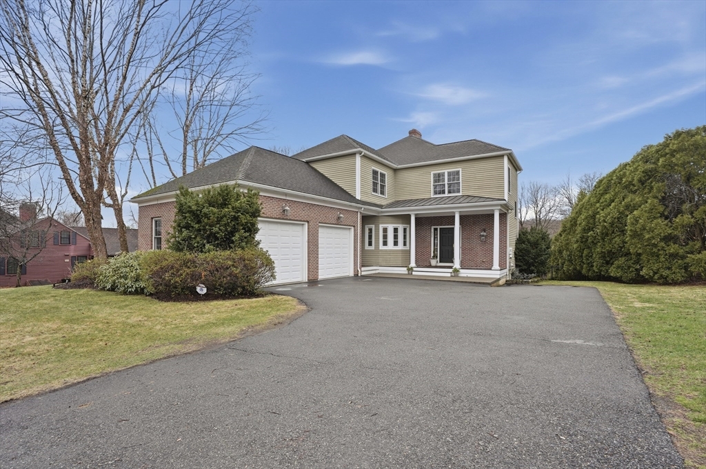 531 Salisbury Street Worcester, MA 01609 - Photo 2 of 42 a front view of a house with garden