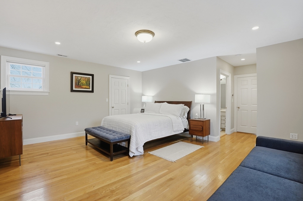 531 Salisbury Street Worcester, MA 01609 - Photo 24 of 42 a bedroom with double bed and a couch