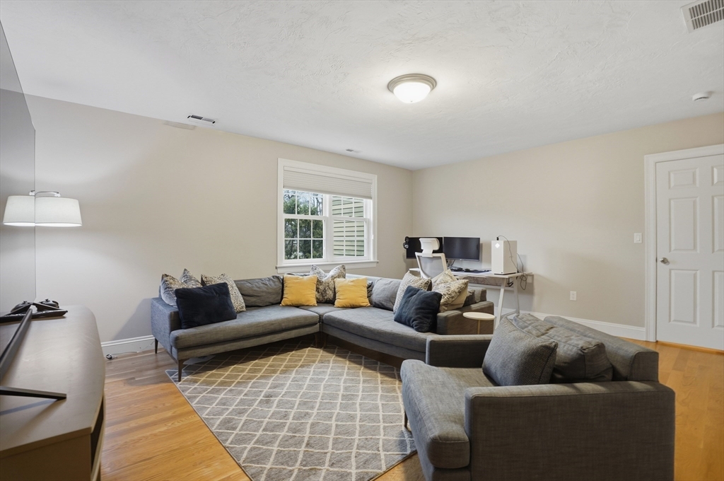 531 Salisbury Street Worcester, MA 01609 - Photo 30 of 42 a living room with furniture and a couch
