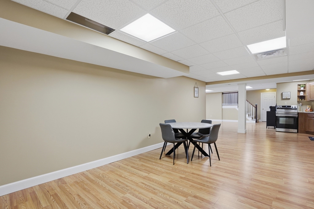 531 Salisbury Street Worcester, MA 01609 - Photo 35 of 42 a dining room with furniture and wooden floor