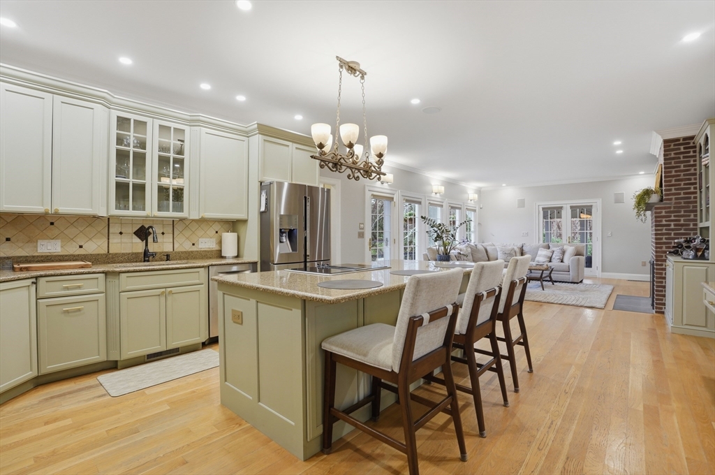 531 Salisbury Street Worcester, MA 01609 - Photo 5 of 42 a kitchen with a table and chairs in it